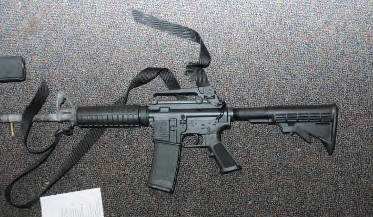 The Bushmaster semiautomatic rifle Adam Lanza used with such deadly results in the Sandy Hook Elementary School massacre. Its manufacturer and those who handled the gun sale are targeted in a lawsuit by the victims' families.