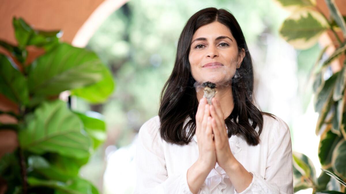 Breathwork practitioner Ana Lilia leads clients in a mix of breathing exercises and guided meditations, an activity that “makes me feel better,” she says.