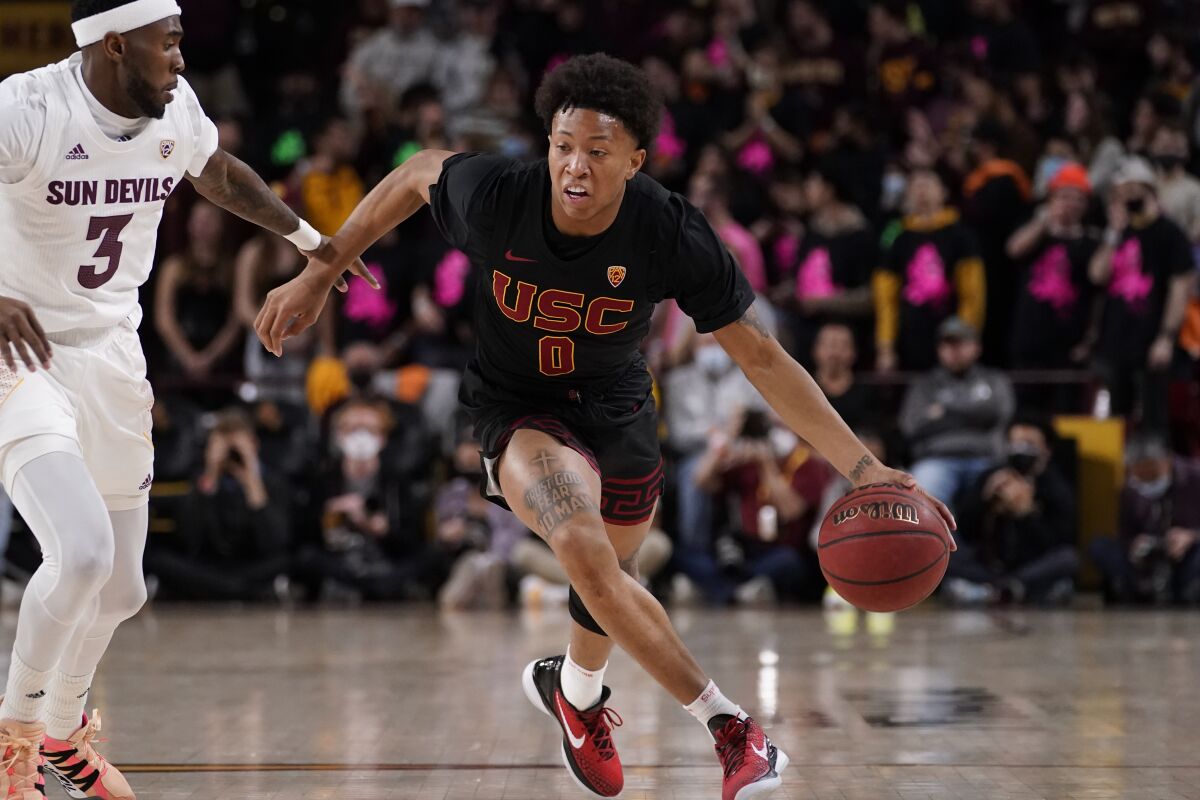 USC guard Boogie Ellis drives to the basket against Arizona State.
