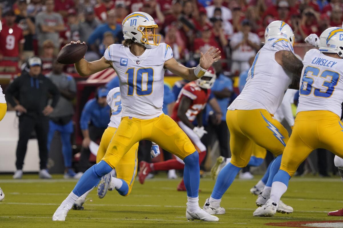 Chargers quarterback Justin Herbert passes during the first half against the Chiefs.