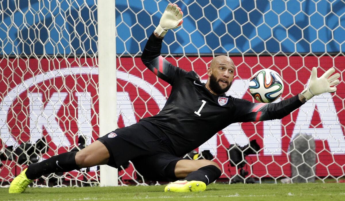 U.S. goalkeeper Tim Howard makes a save against Belgium in a round of 16 game in the World Cup on Tuesday. Howard made 16 saves against Belgium, the most in a World Cup game in 50 years.