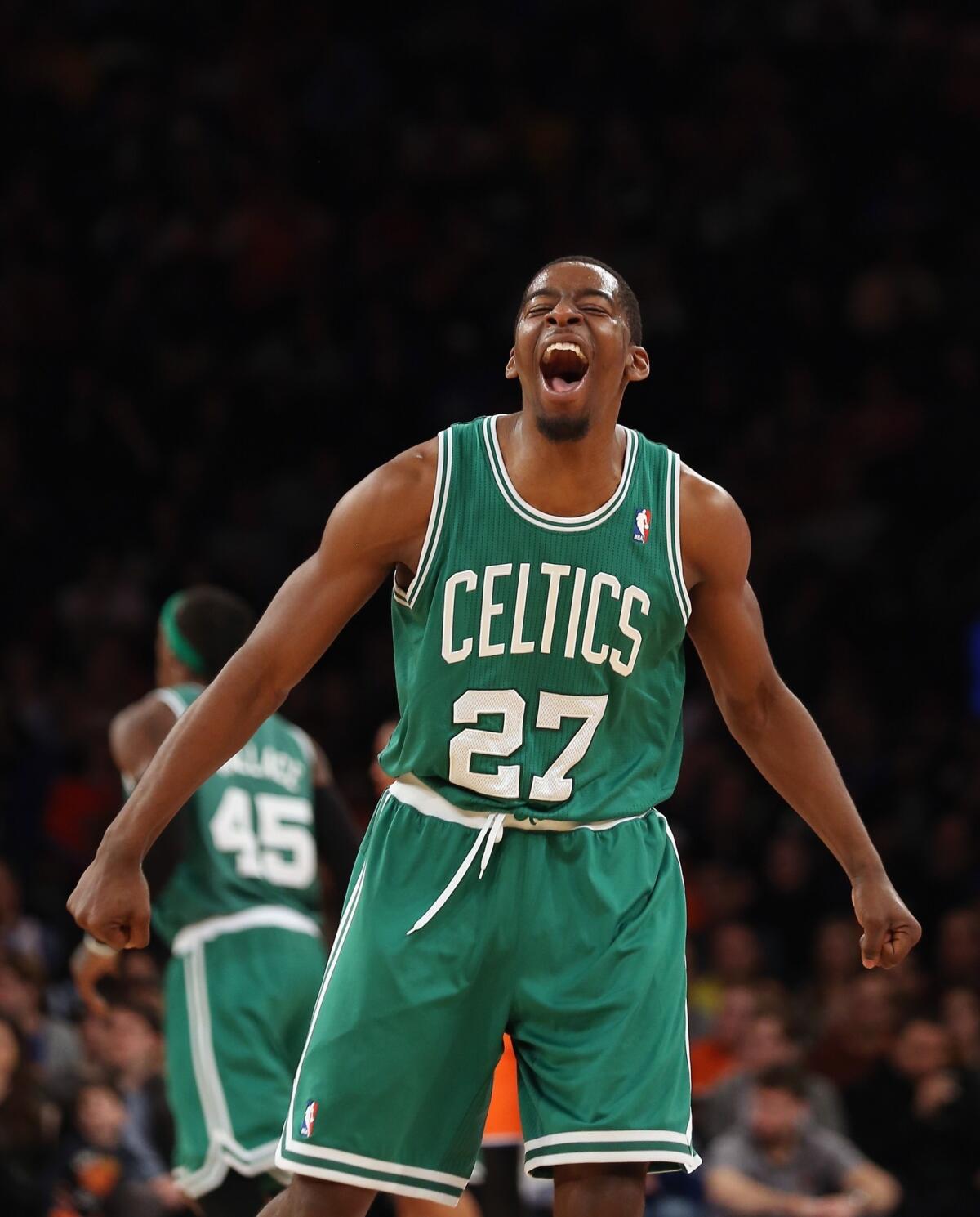 Boston's Jordan Crawford celebrates a basket during the Celtics' 114-73 win over the New York Knicks on Sunday.