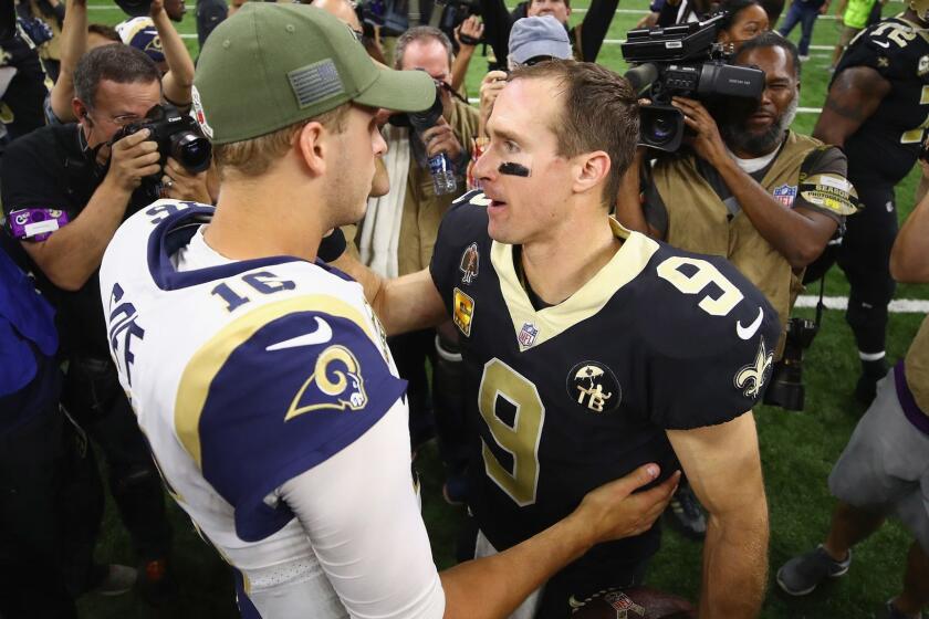 NEW ORLEANS, LA - NOVEMBER 04: Quarterback Jared Goff #16 of the Los Angeles Rams (L) greets quarterback Drew Brees #9 of the New Orleans Saints after the Saints defeated the Ram 45-35 in the game at Mercedes-Benz Superdome on November 4, 2018 in New Orleans, Louisiana. (Photo by Gregory Shamus/Getty Images) ** OUTS - ELSENT, FPG, CM - OUTS * NM, PH, VA if sourced by CT, LA or MoD **