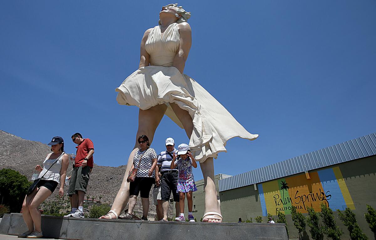 A statue of Marilyn Monroe in downtown Palm Springs, seen in June 2013, has become a tourist attraction.