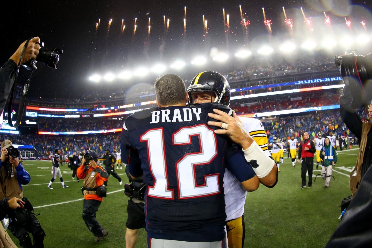 FOXBORO, MA - SEPTEMBER 10: Tom Brady #12 of the New England Patriots and Ben Roethlisberger #7 of the Pittsburgh Steelers embrace after the Patriots defeated the Steelers 28-21 at Gillette Stadium on September 10, 2015 in Foxboro, Massachusetts. (Photo by Maddie Meyer/Getty Images) ** OUTS - ELSENT, FPG - OUTS * NM, PH, VA if sourced by CT, LA or MoD **