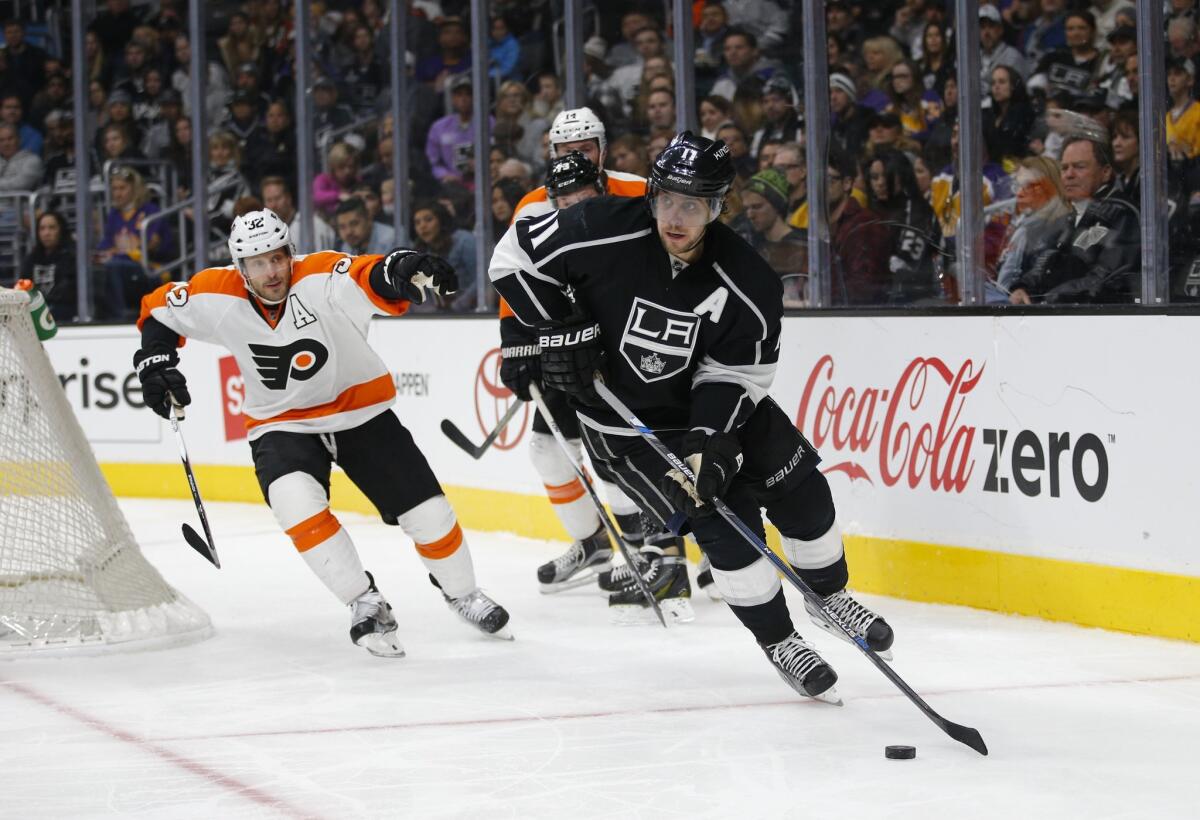 The Kings' Anze Kopitar moves the puck against the Philadelphia Flyers during a Jan. 2 game at Staples Center.