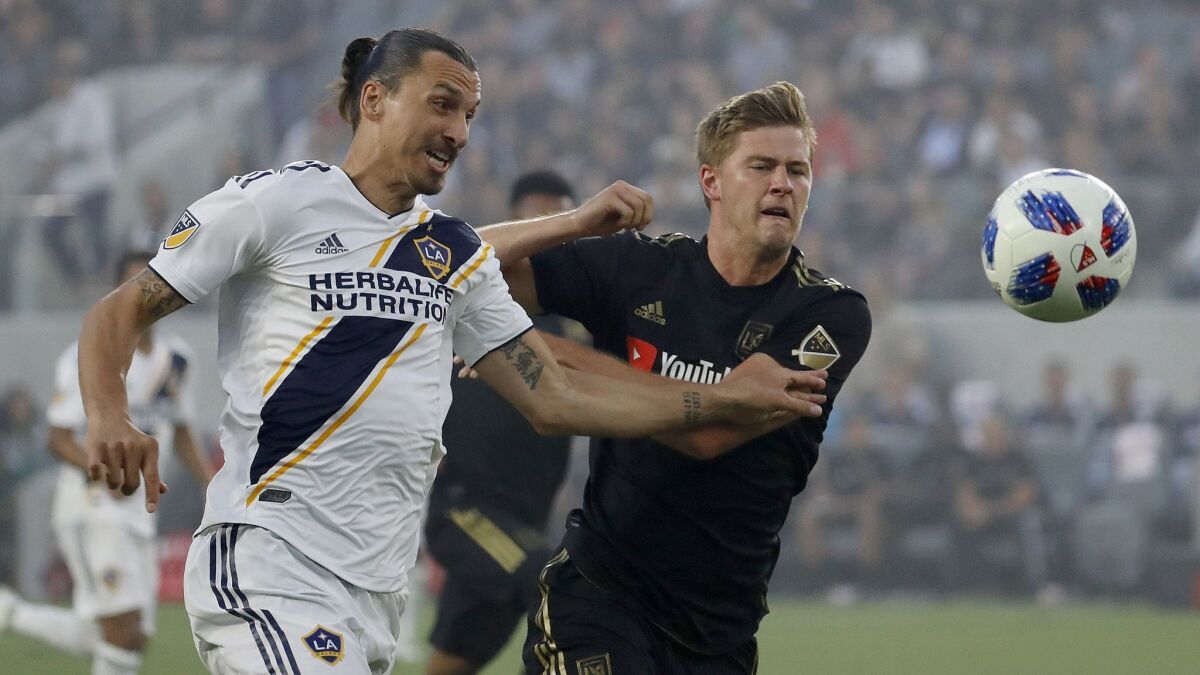 Zlatan Ibrahimovic, left, and the Galaxy are coming off an emotional game against Walker Zimmerman and LAFC.