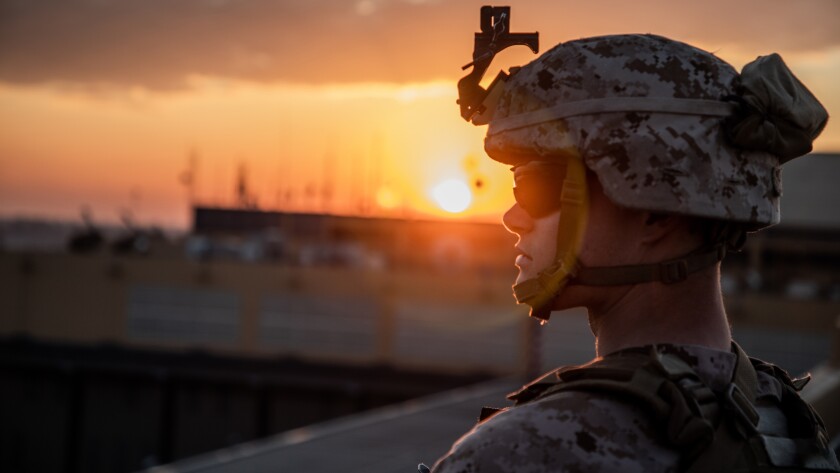 A U.S. Marine with 2nd Battalion, 7th Marines, assigned to the Special Purpose Marine Air-Ground Task Force-Crisis Response-Central Command, stands post during the reinforcement of the Baghdad Embassy Compound in Iraq, Jan. 4, 2020.