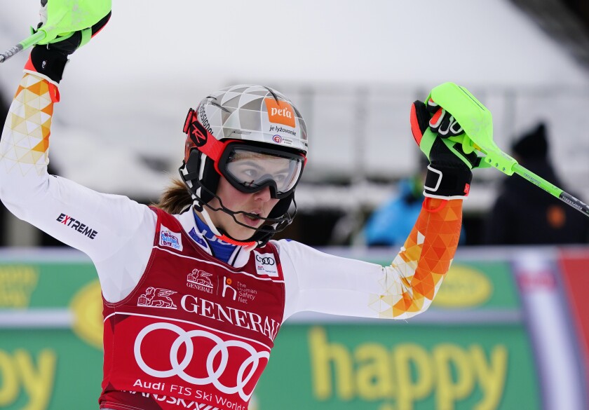 Slovakia's Petra Vlhova celebrates after winning the alpine ski, World Cup women's slalom in Kranjska Gora, Slovenia, Sunday, Jan. 9, 2022. (AP Photo/Pier Marco Tacca)