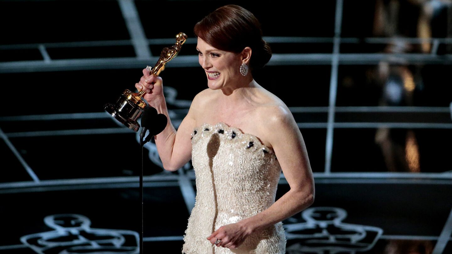Julianne Moore accepts the lead actress Oscar for "Still Alice."