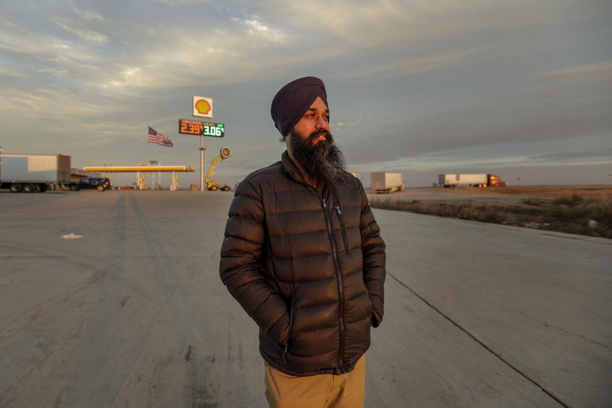 Singh arrives near sunset at Truck Stop 40, one of the largest Sikh-run rest stops, in Sayre, Okla. (Irfan Khan / Los Angeles Times)