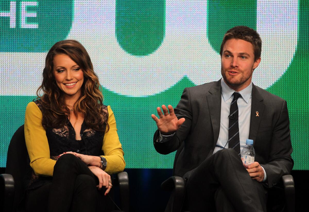 Actors Katie Cassidy and Stephen Amell during a discussion Monday on the 2012 summer Television Critics Assn. tour.