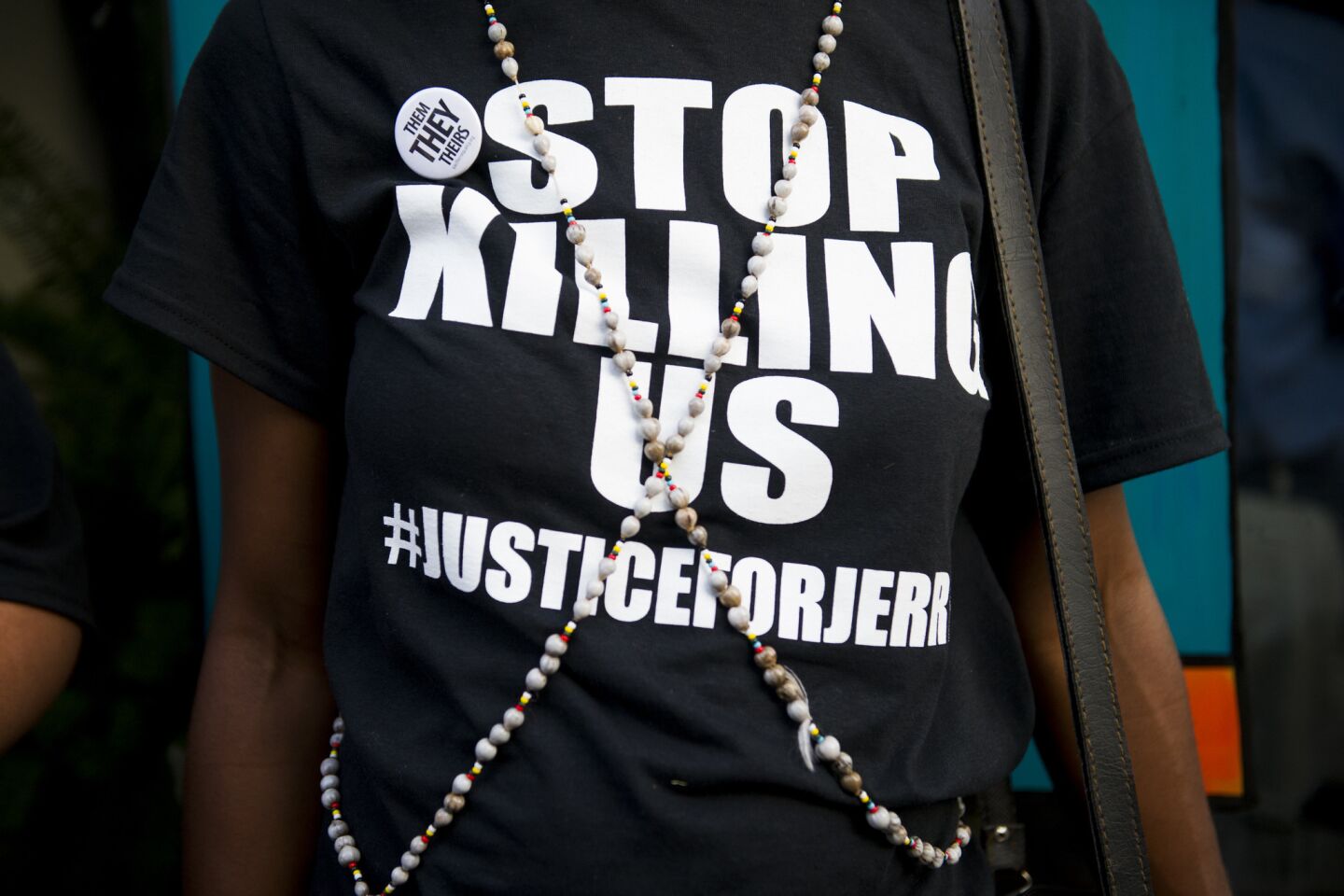 Family members and concerned citizens wear T-shirts in memory of Jai "Jerry" Williams, who was shot and killed by police in Asheville, N.C., on July 2, 2016.