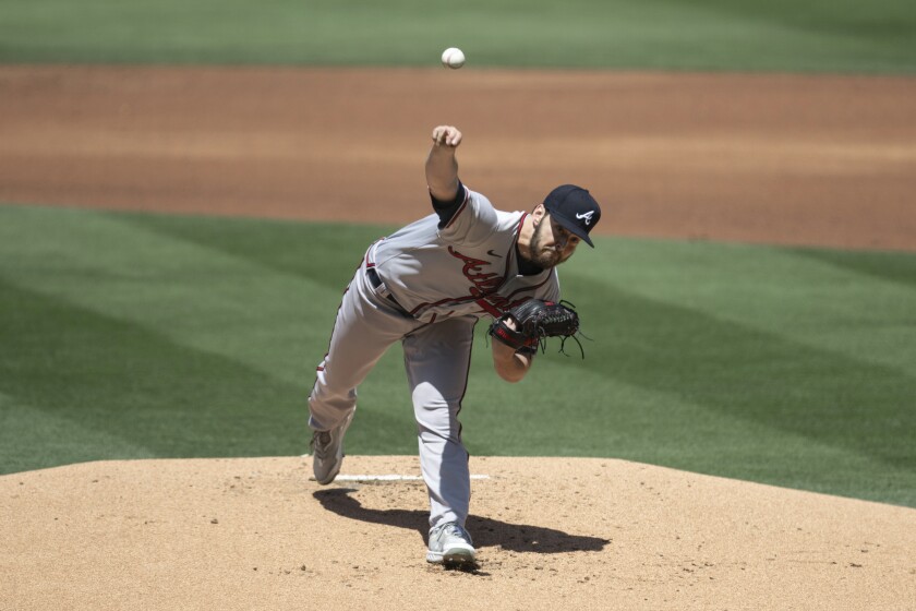 Ian Anderson of the Atlanta Braves throws a pitch at a game against the San Diego Padres on Saturday, April 16, 2022 (AP Photo/Kyusung Gong)