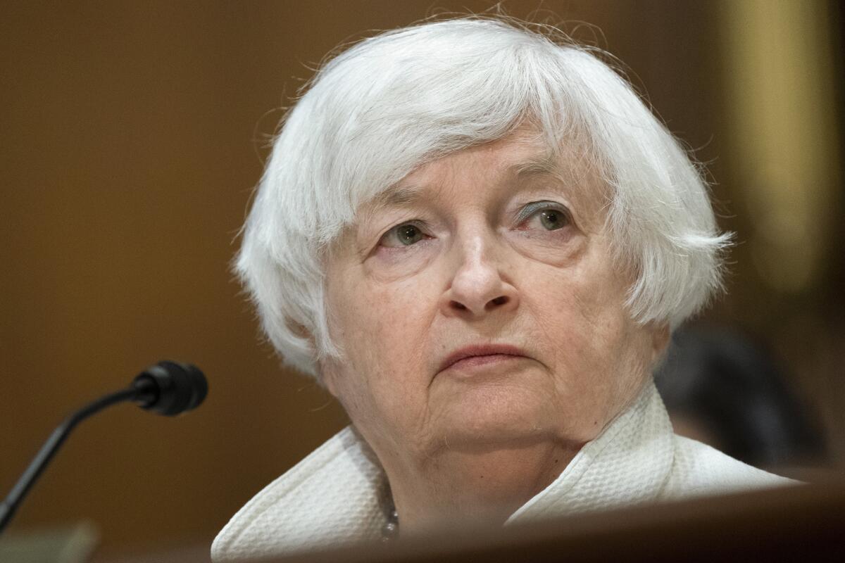 Department of the Treasury Secretary Janet Yellen listens during a hearing