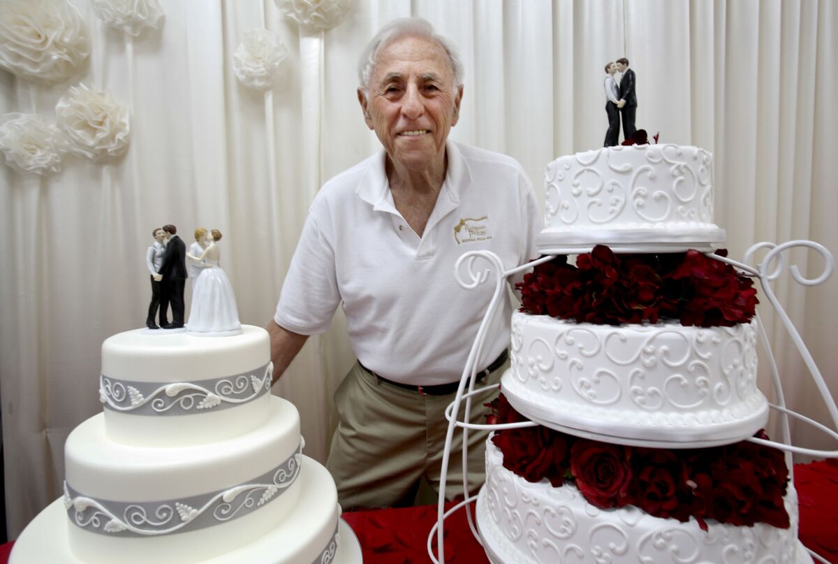Charlie Feder owner of Rossmoor Pastries with wedding cakes celebrating gay marriage.