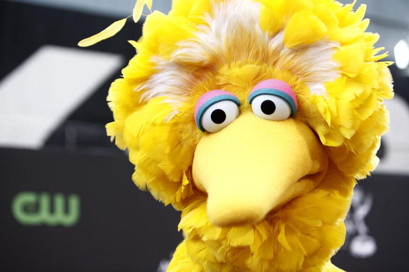 FILE – This Aug. 30, 2009 file photo shows Big Bird, of the children's television show Sesame Street, in Los Angeles. Big Bird is endangered. Jim Lehrer lost control. And Mitt Romney crushed President Barack Obama. Those were the judgments rendered across Twitter and Facebook Wednesday during the first debate of the 2012 presidential contest. While millions turned on their televisions to watch the 90–minute showdown, a smaller but highly engaged subset took to social networks to discuss and score the debate as it unspooled in real time. (AP Photo/Matt Sayles, File)