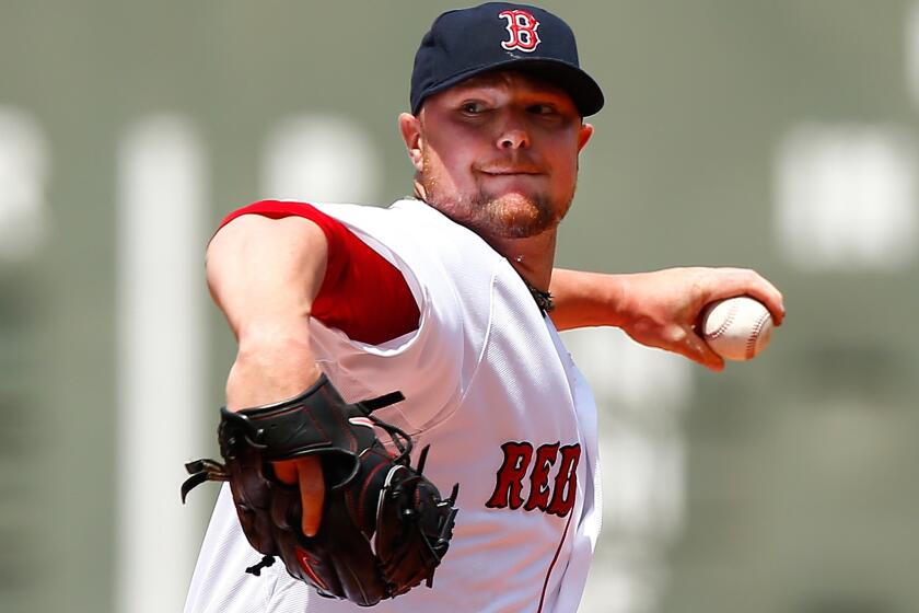 Jon Lester is going from the AL East to the AL West.