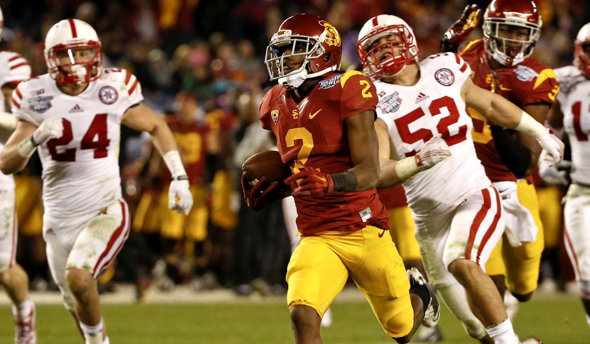 USC receiver Adoree' Jackson beats Nebraska defenders on a 71-yard pass play in the second half of the Holiday Bowl on Dec. 27.