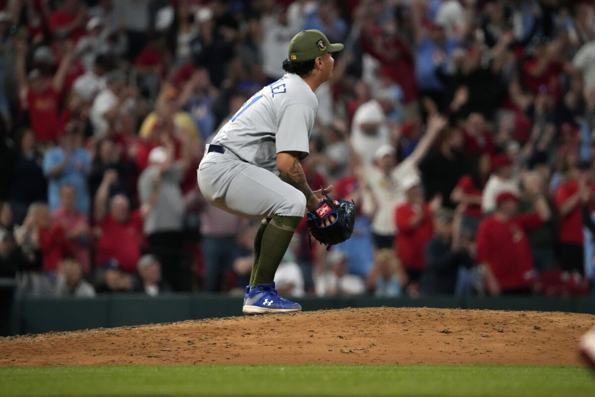 Dodgers reliever Victor González watches a three-run home run hit by the Cardinals' Nolan Gorman on May 20, 2023.