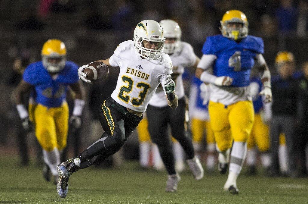 Edison's EJ Ginnis cuts upfield during the CIF Southern Section Division 3 championship game against La Mirada.