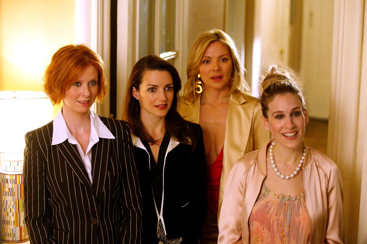 Cynthia Nixon, Kristin Davis, Kim Cattrall and Sarah Jessica Parker look perplexed in an episode of "Sex and the City."