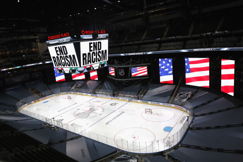"End Racism" is displayed on the scoreboard Wednesday at Rogers Place in Edmonton.