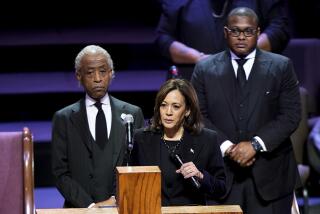 Vice President Kamala Harris speaks during the funeral service for Tyre Nichols at Mississippi Boulevard Christian Church in Memphis, Tenn., on Wednesday, Feb. 1, 2023. Standing are Rev. Al Sharpton and Rev. Dr. J. Lawrence Turner. Nichols died following a brutal beating by Memphis police after a traffic stop. (Andrew Nelles/The Tennessean via AP, Pool)