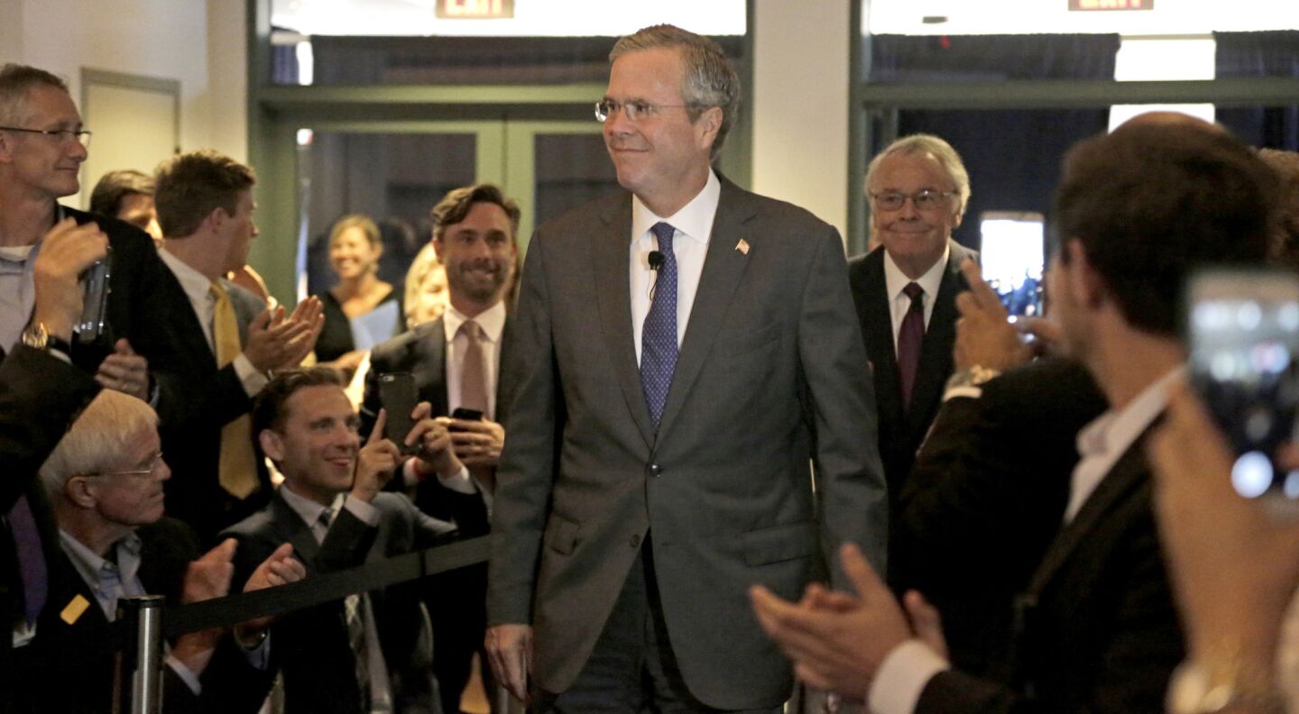Jeb Bush arrives for his speech.