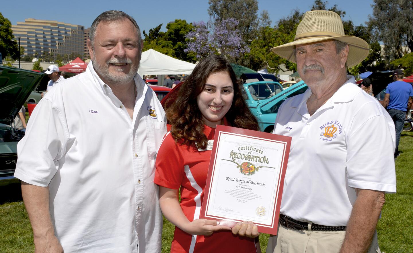 Honoring the Road Kings, represented by show Chairman Don Baldaseroni, left, and President Ray Astamendi, Arda Tchakian presented a certificate of recognition on behalf of state Senator Anthony Portantino.