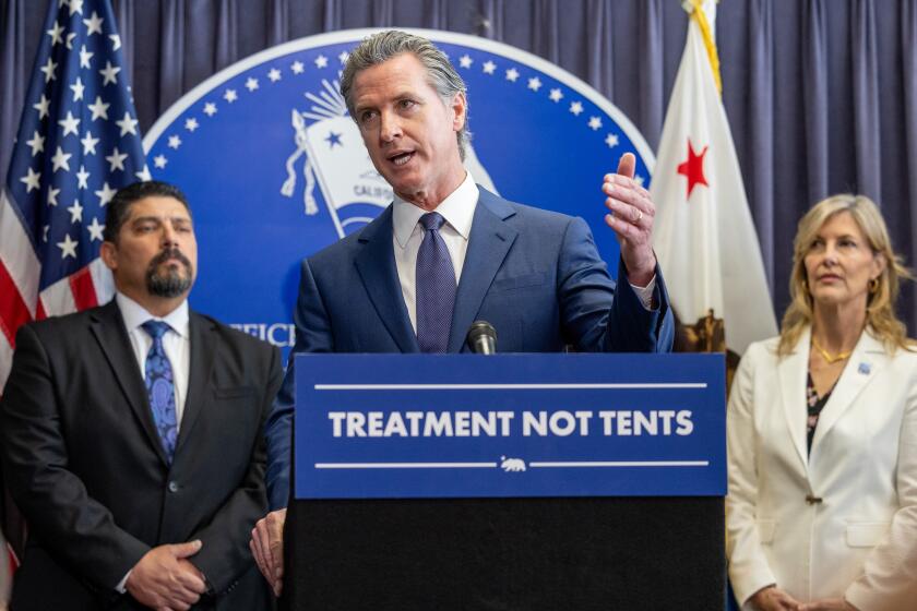 Los Angeles, CA - March 21: California Governor Gavin Newsom speaks at a press conference about the passage of Proposition 1, a $6.4 billion bond to fund treatment and housing for homeless people with severe mental illnesses and addiction on Thursday, March 21, 2024 in Los Angeles, CA. (Brian van der Brug / Los Angeles Times)