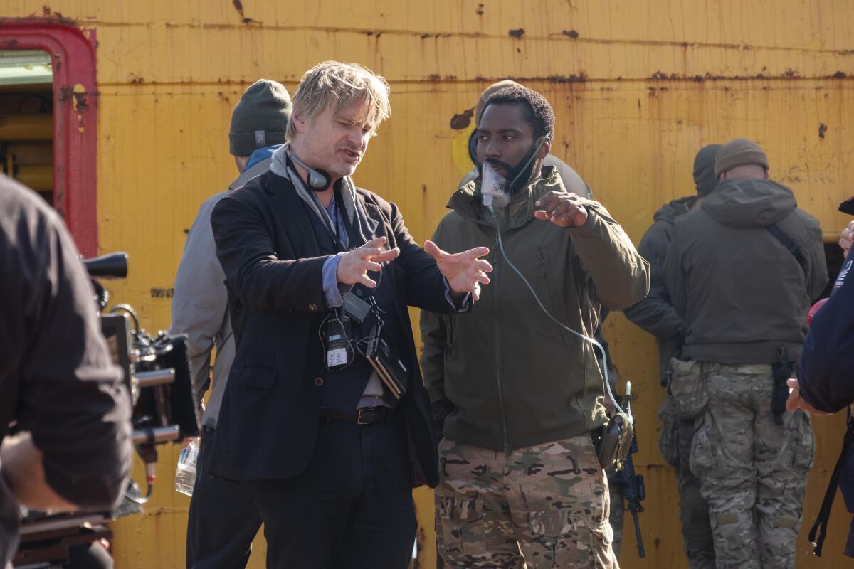 Tenet Director Christopher Nolan and actor John David Washington.