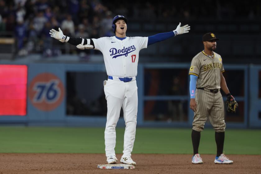 Los Angeles, CA, Wednesday, September 25, 2024 - Los Angeles Dodgers designated hitter Shohei Ohtani (17) celebrates after hitting a fourth inning rbi double against the Padres at Dodger Stadium. (Robert Gauthier/Los Angeles Times)