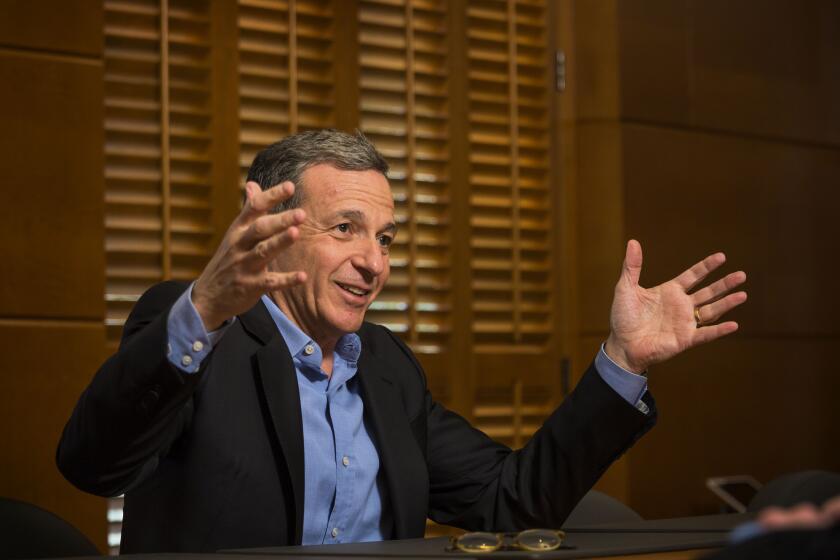 Walt Disney Co. Chairman and Chief Executive Robert Iger speaks to the media on Dec. 10 about the proposed NFL stadium in Carson.