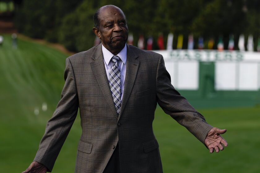 Lee Elder poses for a picture at the Masters golf tournament Monday, Nov. 9, 2020, in Augusta, Ga.