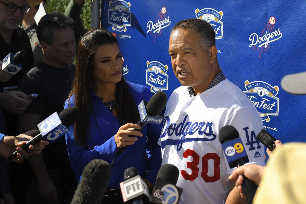 Manager Dave Roberts is interviewed during Dodgers FanFest in 2020.