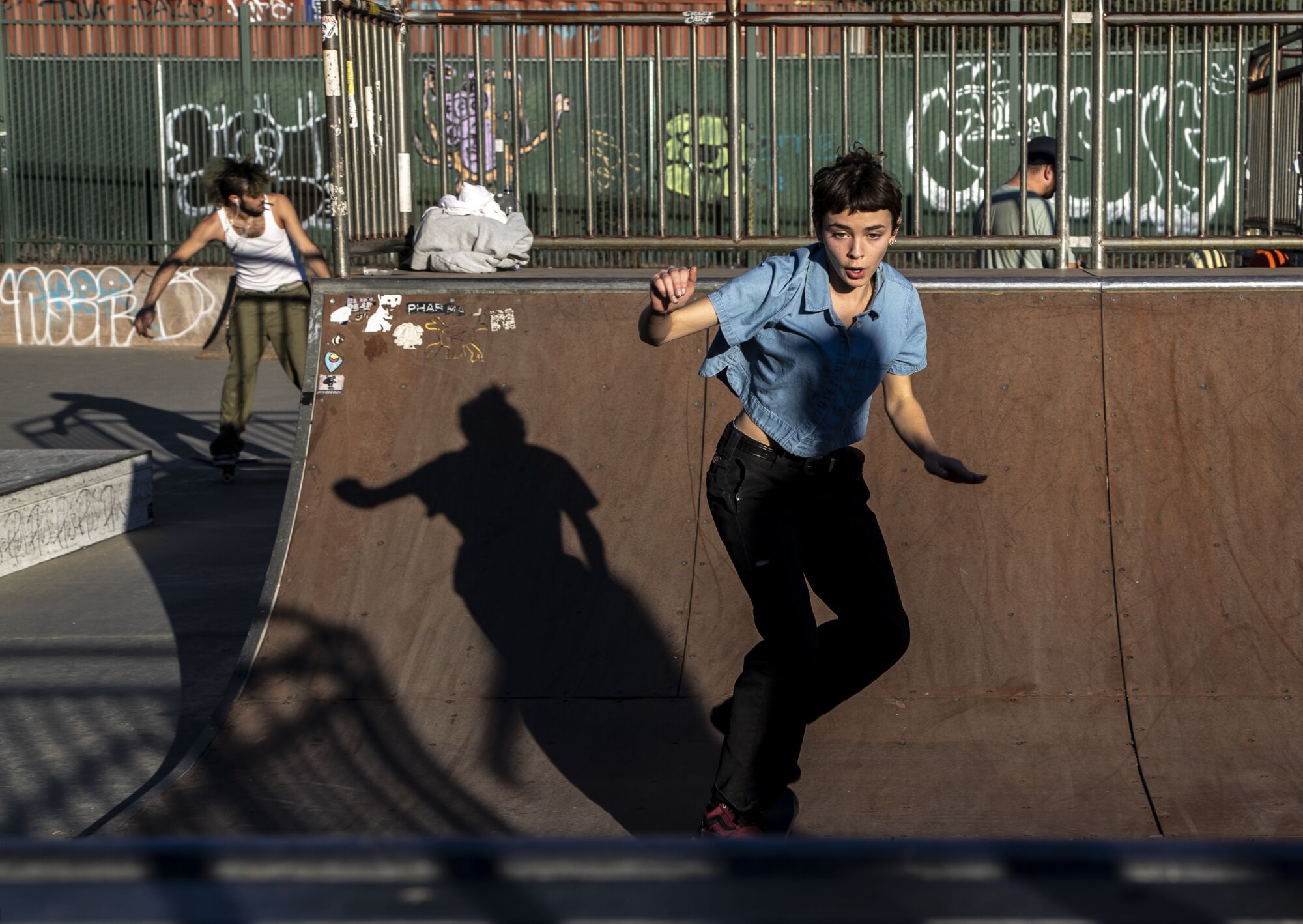 Aunt Skatie crew member Dan Haase rolls down a quarterpipe at South Pasadena Skate Park.