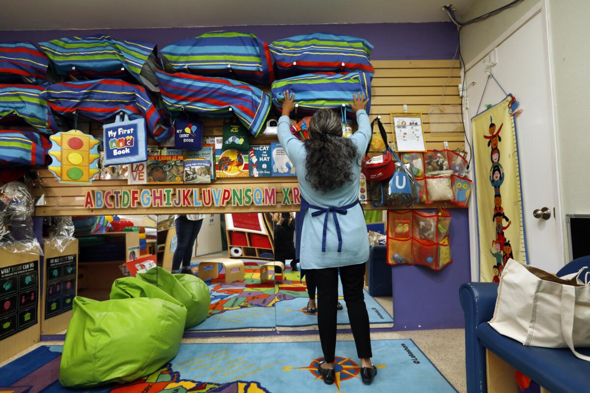 An instructor organizes a child-care center