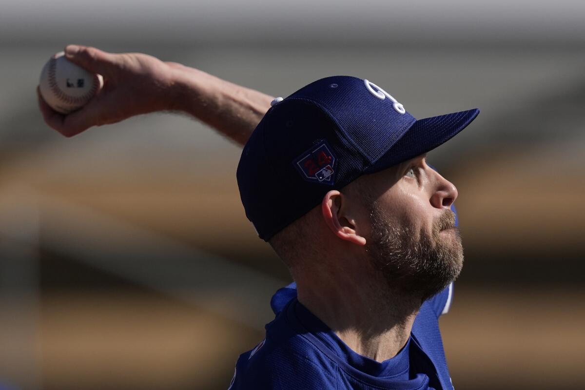 Dodgers pitcher James Paxton throws during the first day of spring training on Feb. 9.