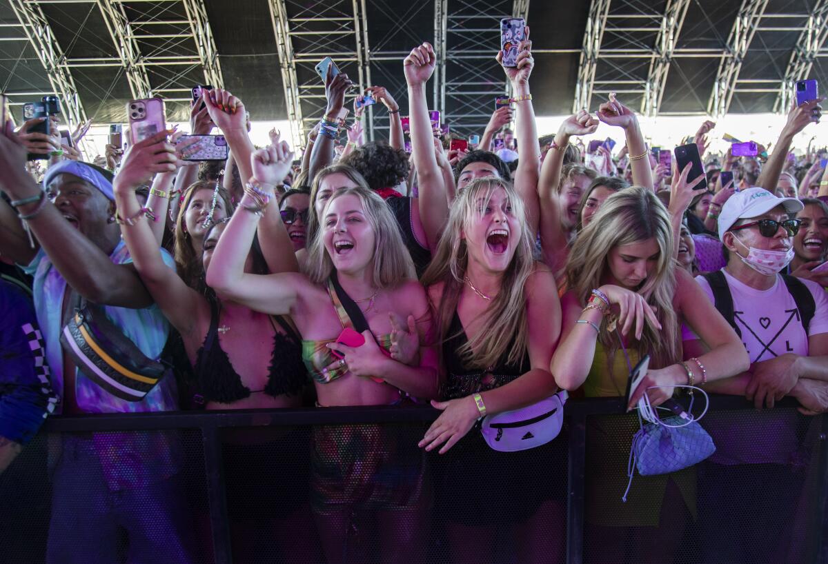 Masks were scarce at the Coachella Music Festival in Indio.