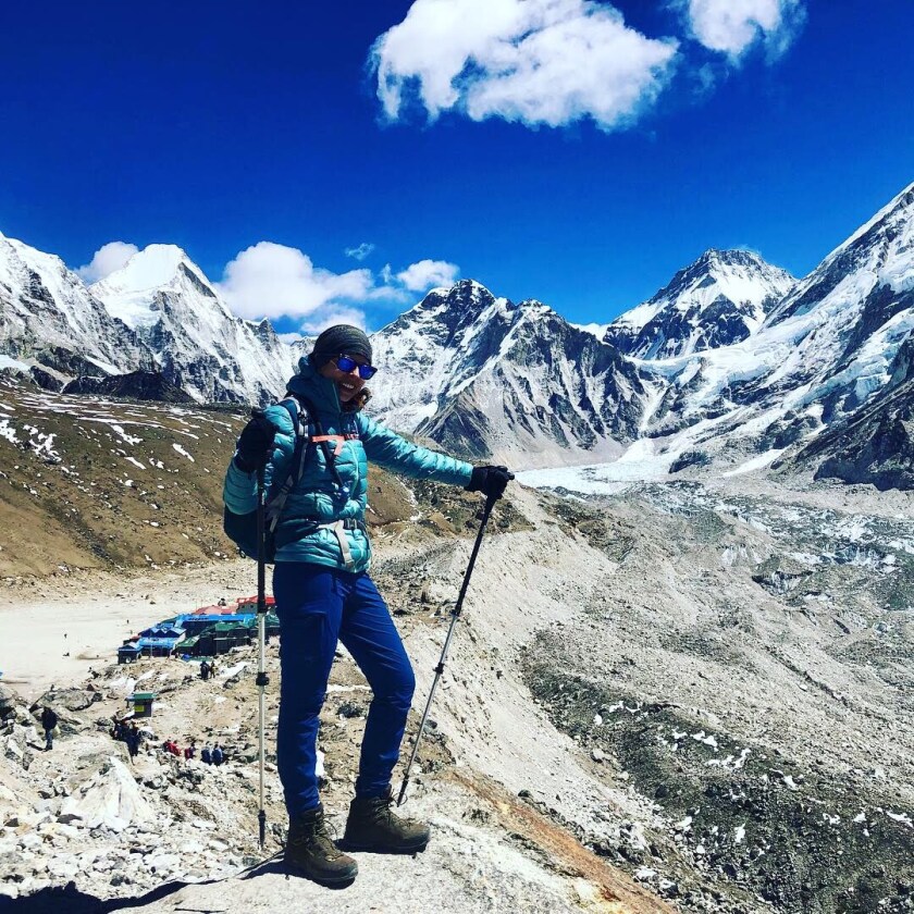 Marisa Sanchez, 29, of San Diego pauses on her nine-day hike to Mount Everest base camp in Nepal, which she reached on April 1, 2019.