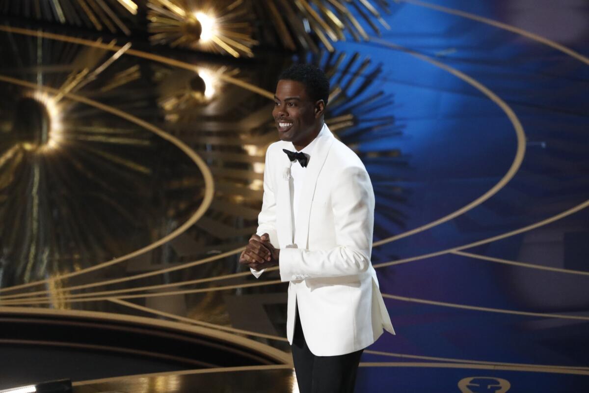 Chris Rock performs during the telecast of the 88th Academy Awards at the Dolby Theatre on Feb. 28.