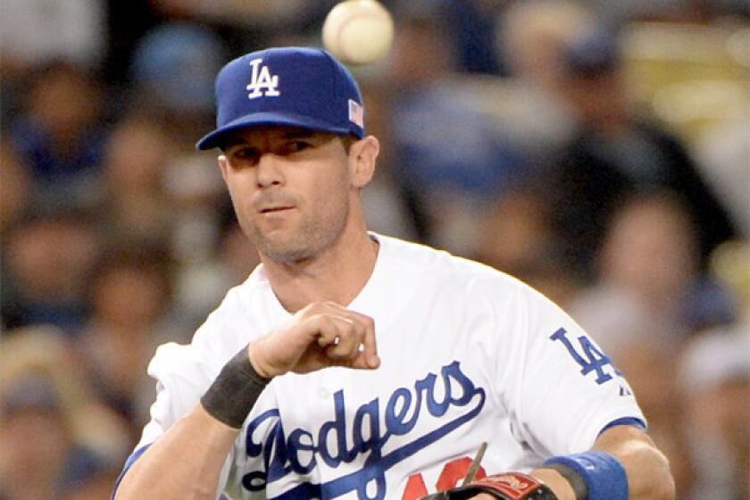 Infielder Michael Young is mulling whether to return to the Dodgers for his 15th major league season or hang up his glove for good.