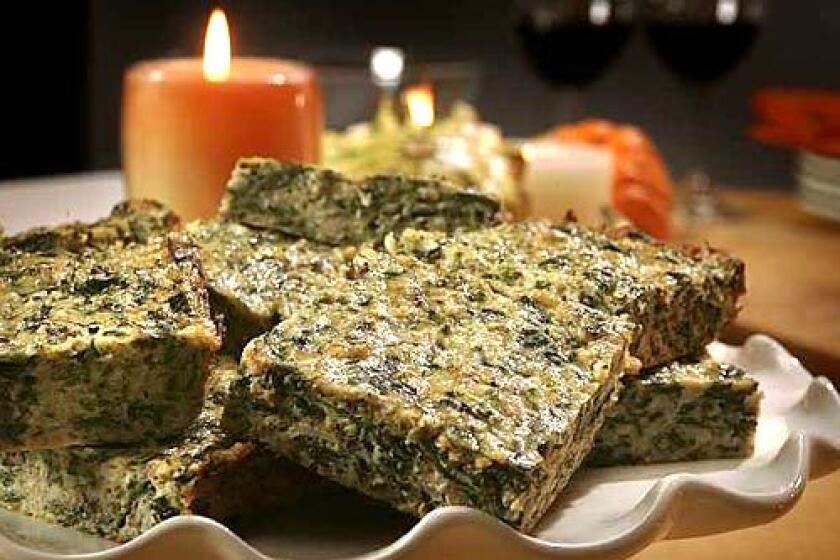 Cut small, these quiche-like collard squares are perfect hors doeuvres, but in big squares they are an excellent vegetarian entree.