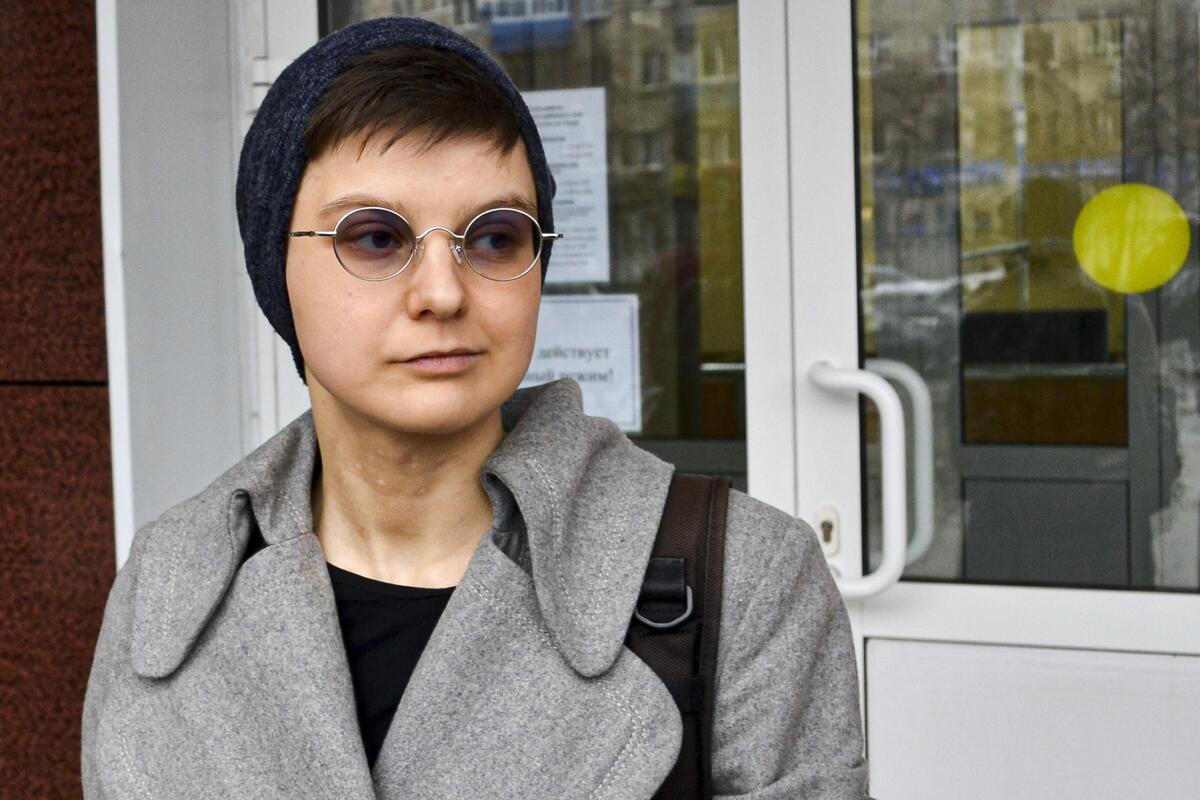 Feminist activist and artist Yulia Tsvetkova leaves after a court session in Komsomolsk-on-Amur, Russia, Monday, April 12, 2021. A Russian court on Monday opened the trial of Yulia Tsvetkova charged with disseminating pornography after she shared artwork depicting female genitalia online -- a case in line with the Kremlin’s conservative stance promoting “traditional family values.” (AP Photo/Alexander Permyakov)