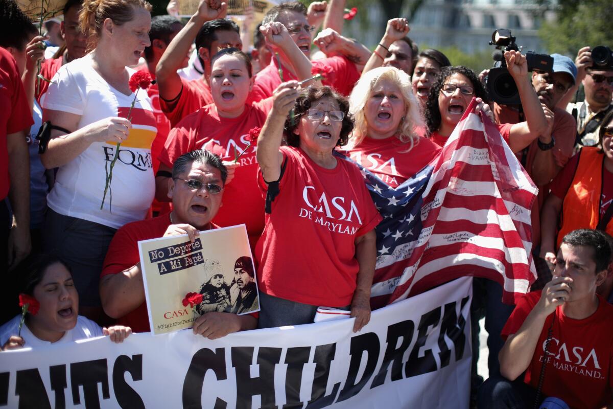 More than 300 demonstrators protest at the White House in August 2014 to demand President Obama halt deportations.