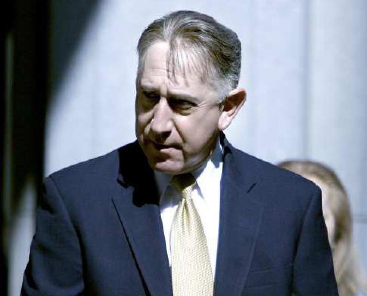 Former Glendale city councilmember John Drayman arrives at the C. S. Foltz Criminal Justice Center in Los Angeles to be arraigned on charges on Tuesday, May 8, 2012.