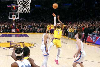 Los Angeles, CA, Tuesday, February7, 2023 - LeBron James launches a fade-away jumper to score his 38,388th career point to attain the NBA scoring title during a game against the Oklahoma City Thunder at Crypto.com Arena. (Robert Gauthier/Los Angeles Times)