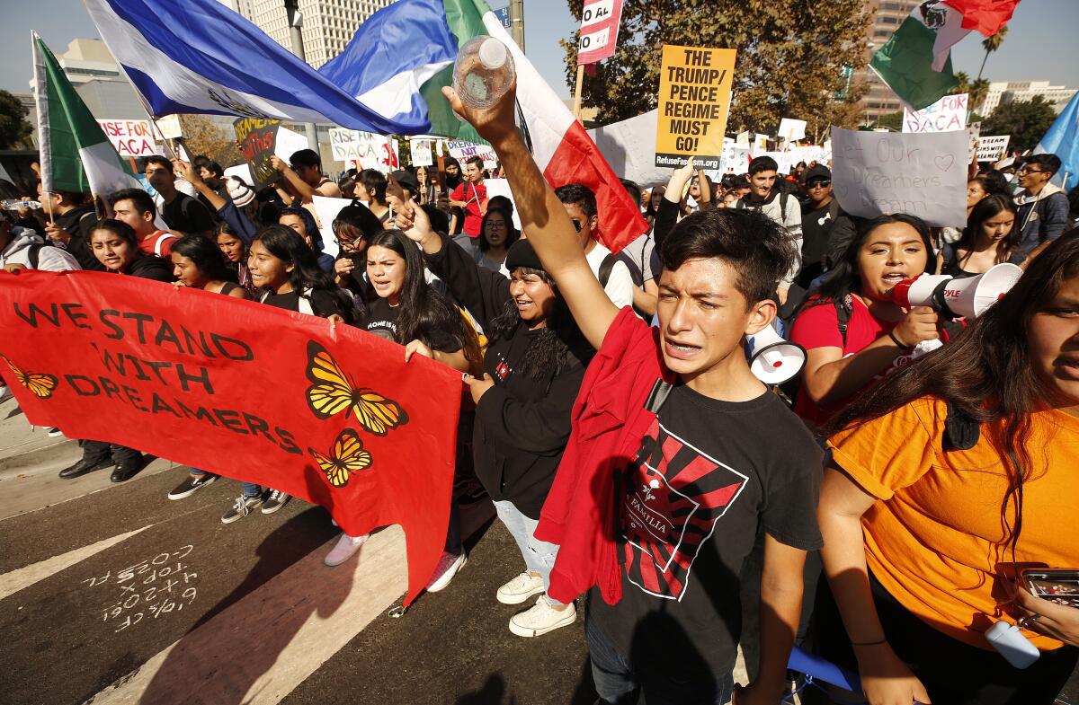 Joseph Moreno joins fellow high schoolers and others at an L.A. march in support of Deferred Action for Childhood Arrivals.
