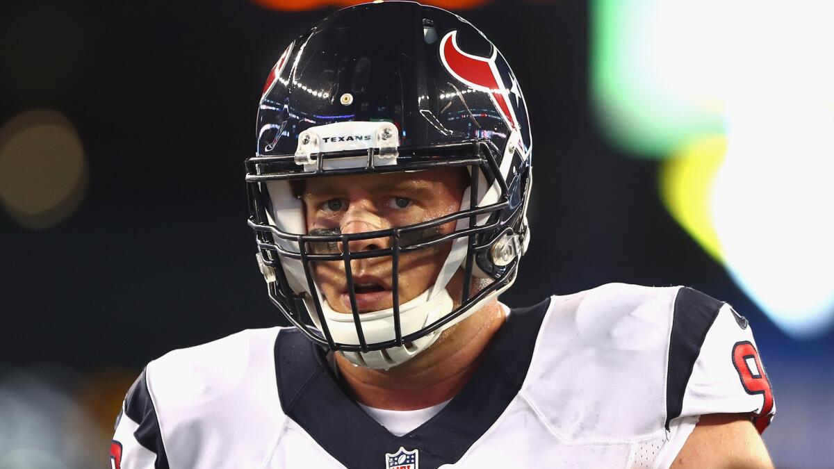 Texans defensive end J.J. Watt gets set to play against the Patriots last week.